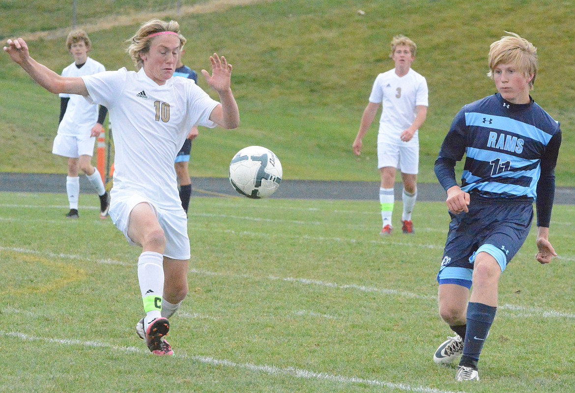 POLSON HIGH School soccer player Bridger Wenzel attempts to possess the ball at midfield during the Class A quarterfinal game against Loyola Sacred-Heart Saturday afternoon at Polson High School. (Jason Blasco/Lake County Leader)