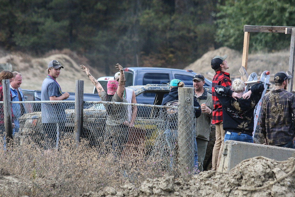 Photo by Mandi Bateman
Spectators wear mud as a badge of pride.