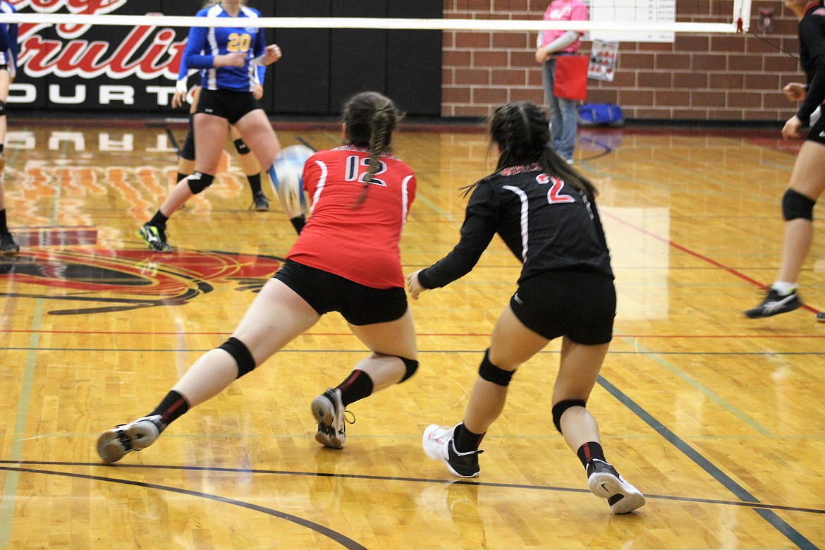 Destiny Angle gets low to earn a dig in Thursday&#146;s game against Clark Fork.