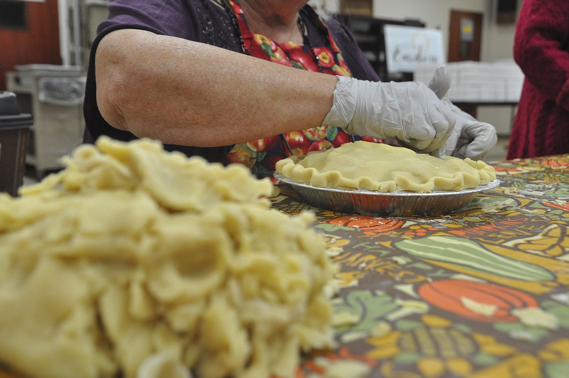 Volunteers assembled 350 apple pies Saturday for the annual Fall Apple Fest held at Immaculate Conception Church in Polson this coming weekend. (Ashley Fox/Lake County Leader)