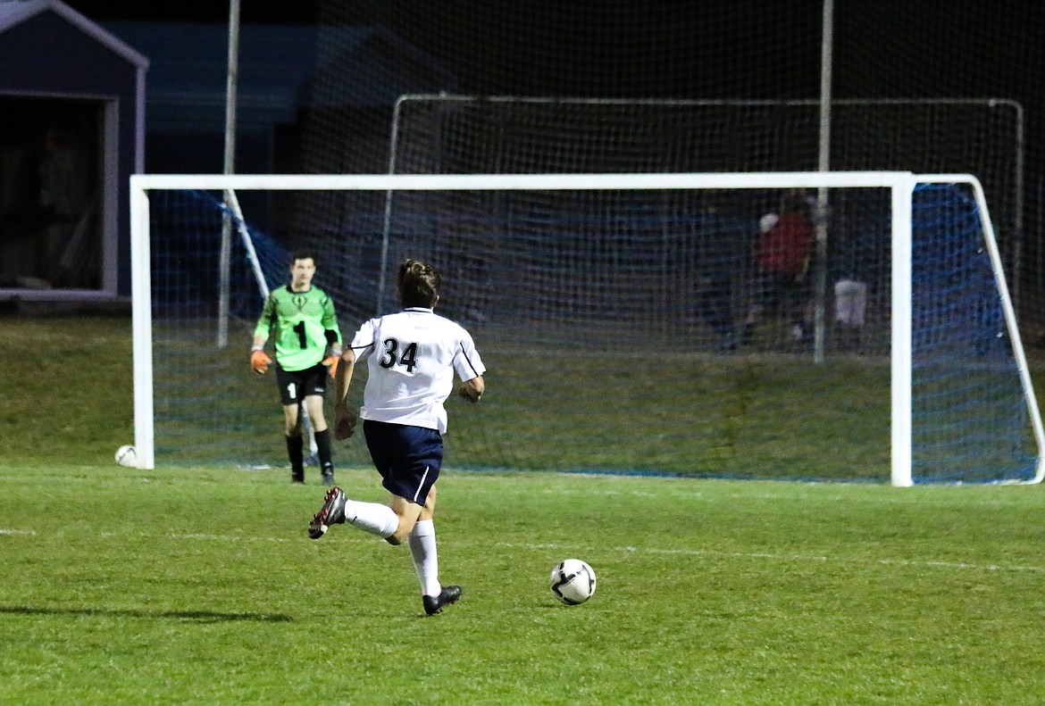 Photo by Mandi Bateman
Daniel Walker preparing to set up a shot on St. Marie&#146;s goalkeeper.