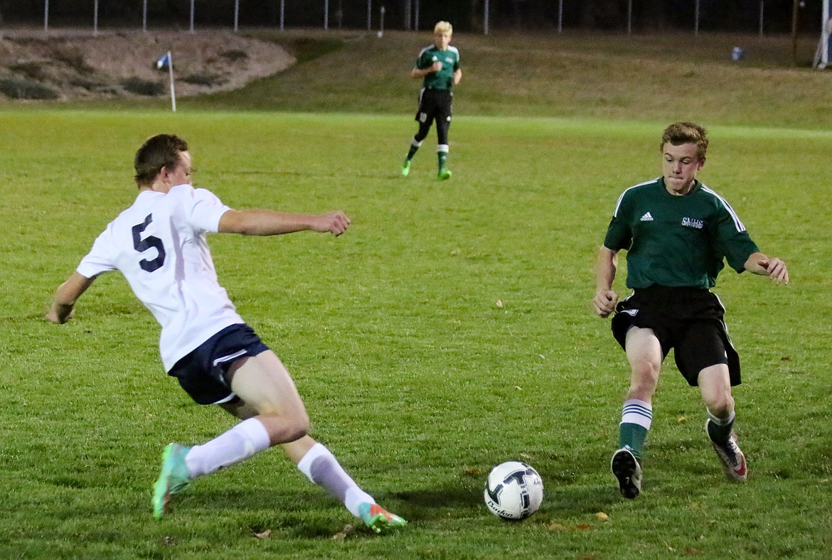 Photo by Mandi Bateman
Joe Swanson defending the goal from St. Marie&#146;s forward.