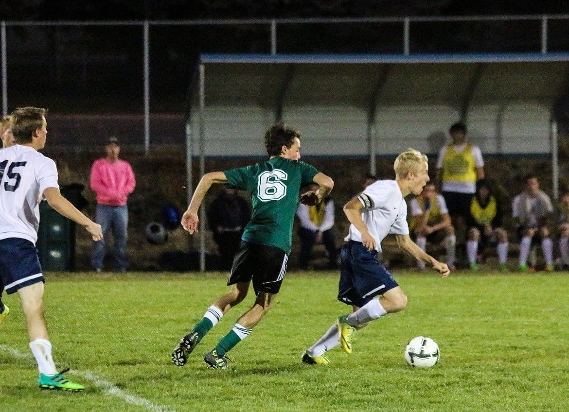 Photo by Mandi Bateman
Tyler Beazer controlling the midfield ball.