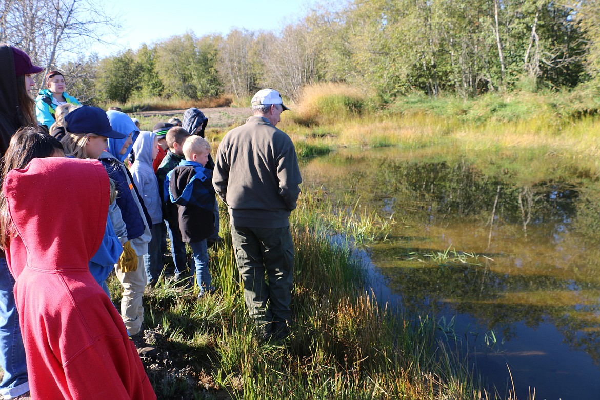 (Photo by MARY MALONE)
The students of Southside Elementary School learned about the Cocolalla Wetland Restoration Project by Idaho Fish and Game officials during a tour of the property last week.