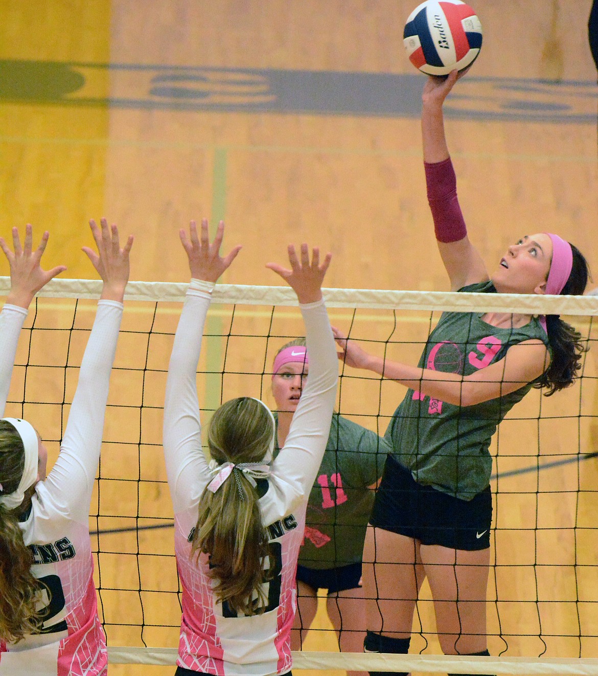 POLSON LADY PIRATES volleyball player Kaelyn Smith delivers a shot over to the Ronan Maidens defense during the Polson-Ronan match Saturday afternoon at Linderman Gym. (Jason Blasco/Lake County Leader)