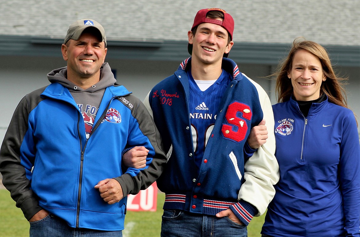 Superior Senior Kaleb Ververis with his parents during Saturday&#146;s game in Superior. (Photo by Frankie Kelly).