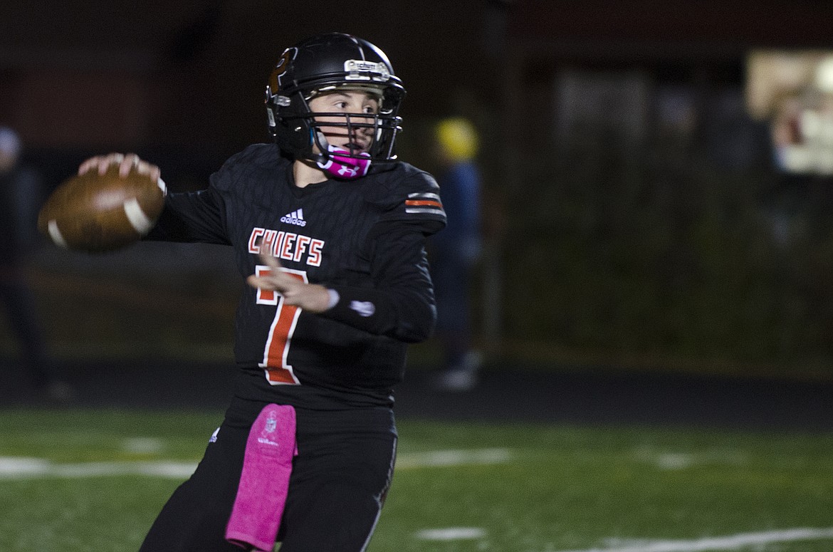 RONAN HIGH School sophomore quarterback Eric Dolence drops back to pass in the game against Columbia Falls Friday night at Ronan High School. Despite the 51-6 loss to the Wildcats, the Chiefs can still compete for a potential playoff spot if they were to win their final two road games against Libby and Browning. They would also need some help from Whitefish who plays Columbia Falls and Libby in their final two games of the season. Last season the Chiefs were eliminated in the quarterfinals in a loss to Whitehall. Ronan hosted its first playoff game since the early 90s at the end of the 2016 season. (photo by Jeremy Weber/Lake County Leader)