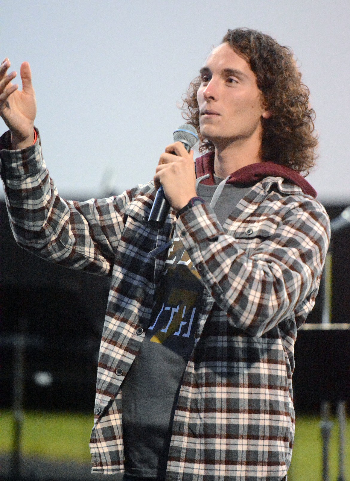 FORMER UNIVERSITY of Montana Grizzlie cross country and track player Dillon May delivers his messages during the Fields of Faith event.(Jason Blasco/Lake County Leader)