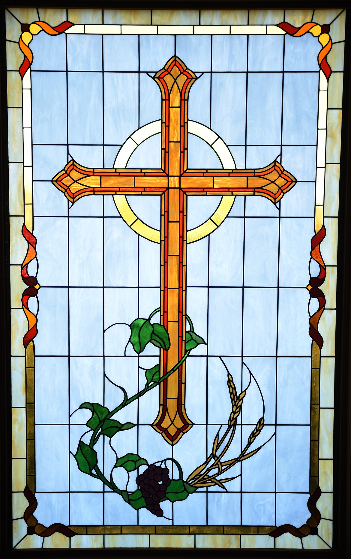 A stained glass cross in the lobby area of Christ Lutheran Church in Whitefish on Wednesday, October 25. (Brenda Ahearn/Daily Inter Lake)
