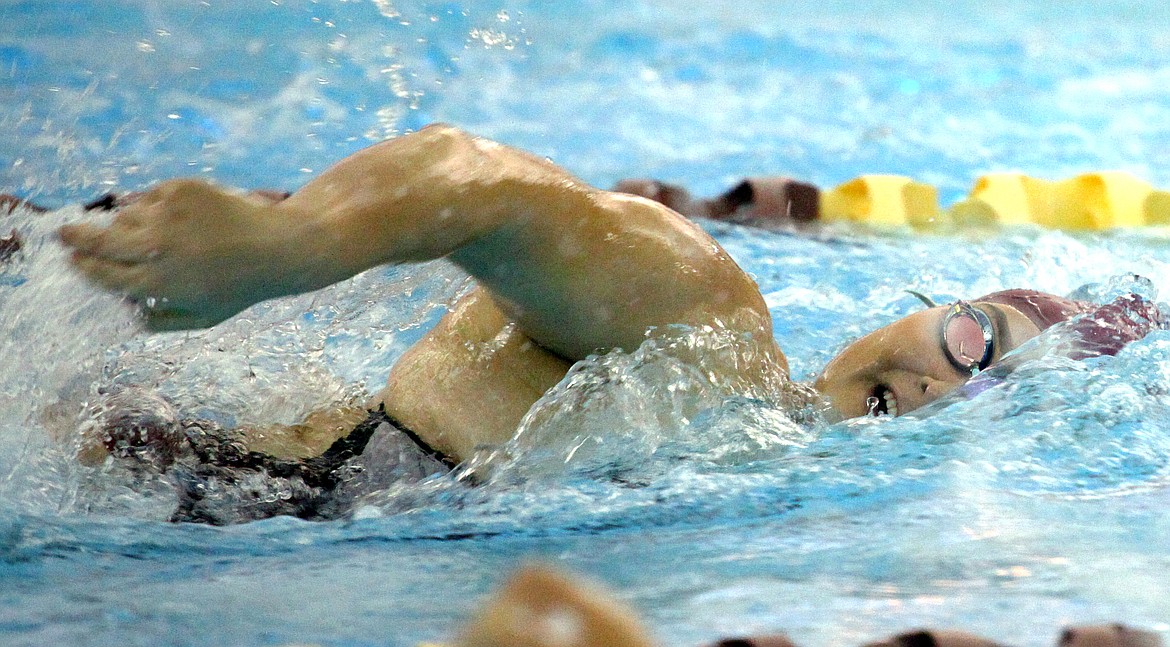 Rodney Harwood/Columbia Basin HeraldMoses Lake freestyler Cora Dana works during the preliminaries of the 100-yard freestyle at the NCWAA 4A District 6 Swim Championships Thursday at the Tony St. Onge Pool of Dreams.