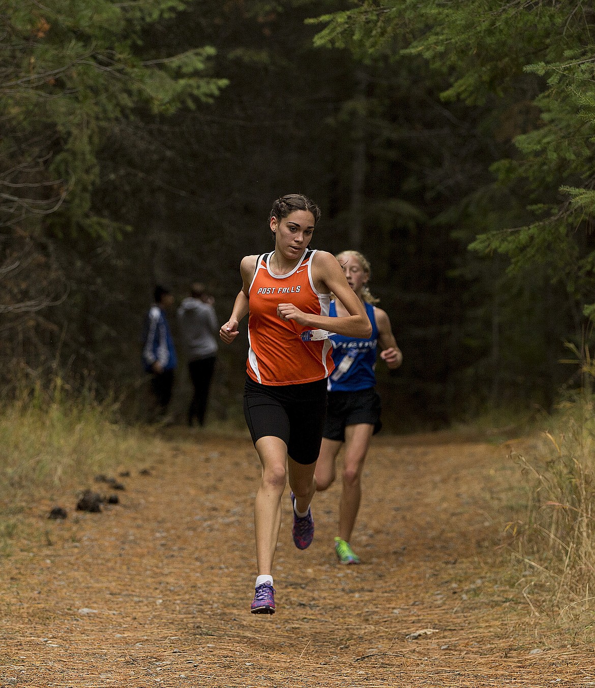 LOREN BENOIT/Press
Sydney Shanahan keeps a strong stride during her second lap in the 5A girls race at the 5A and 4A Region 1 meets Thursday afternoon at Farragut State Park.