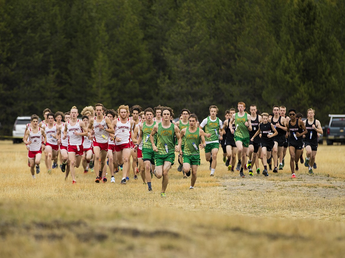 LOREN BENOIT/Press

Lakeland&#146;s Skyler White, center, leads a group of runners from the start during the 4A boys state-qualifying meet Thursday afternoon at Farragut State Park.