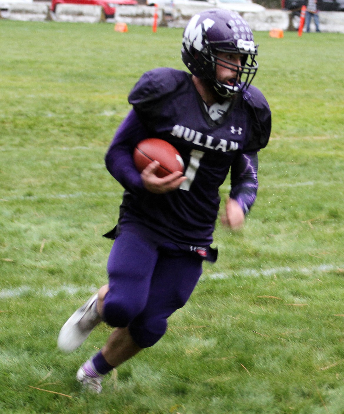 Mullan running back Skye Gallaway races toward the end zone.