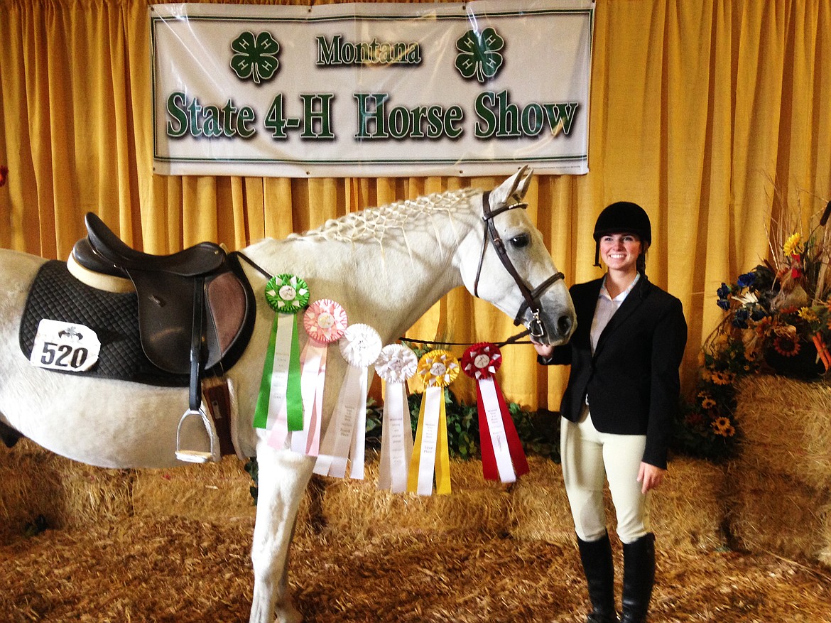 Jessica Bronner with her gelding Ben posing with ribbons won at the 4-H State Show. (Photo supplied by Cindy Bronner)