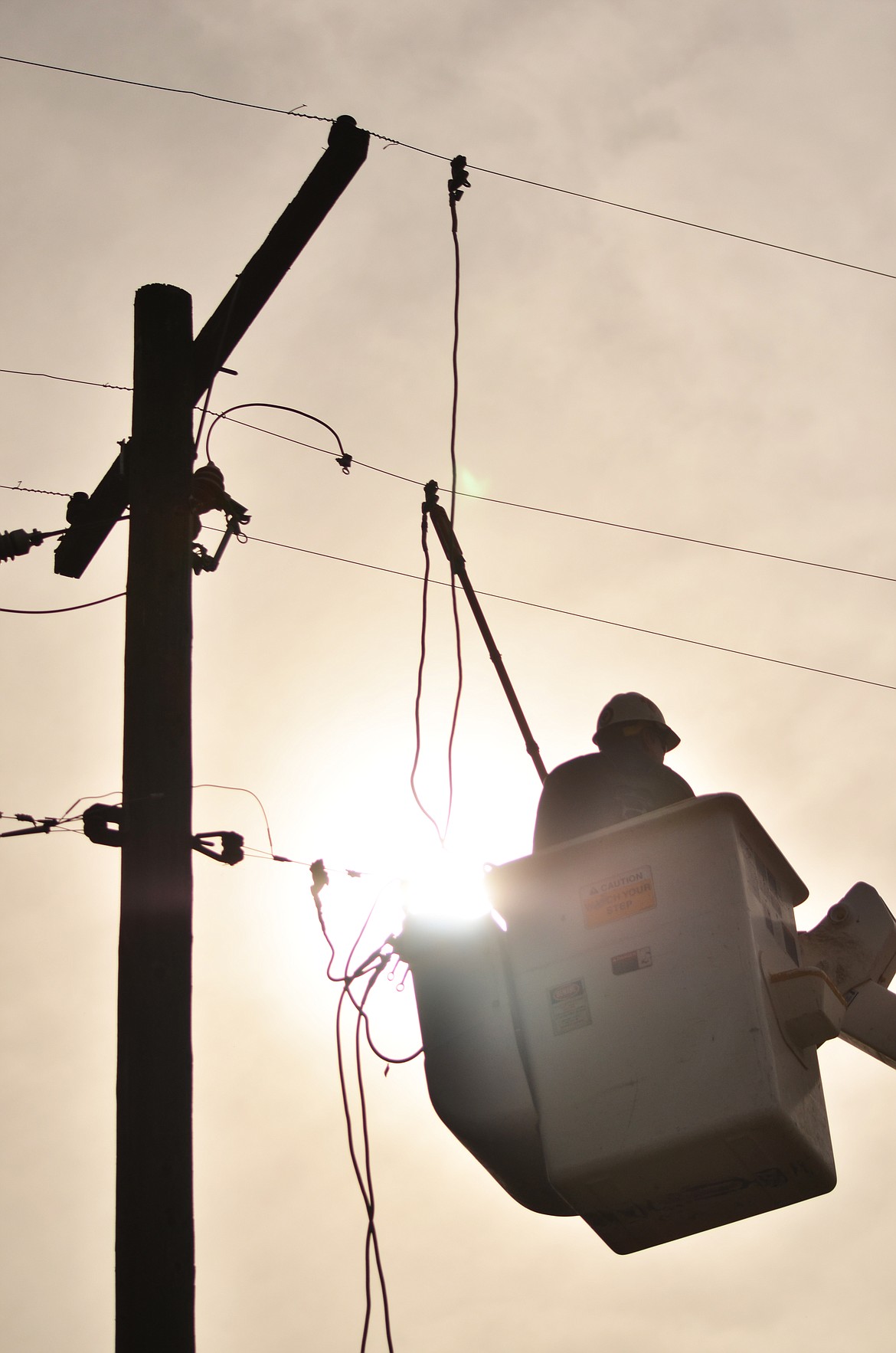 Linemen from NorthWestern Energy didn&#146;t waste time getting power restored to Plains (Erin Jusseuame/ Clark Fork Valley Press)