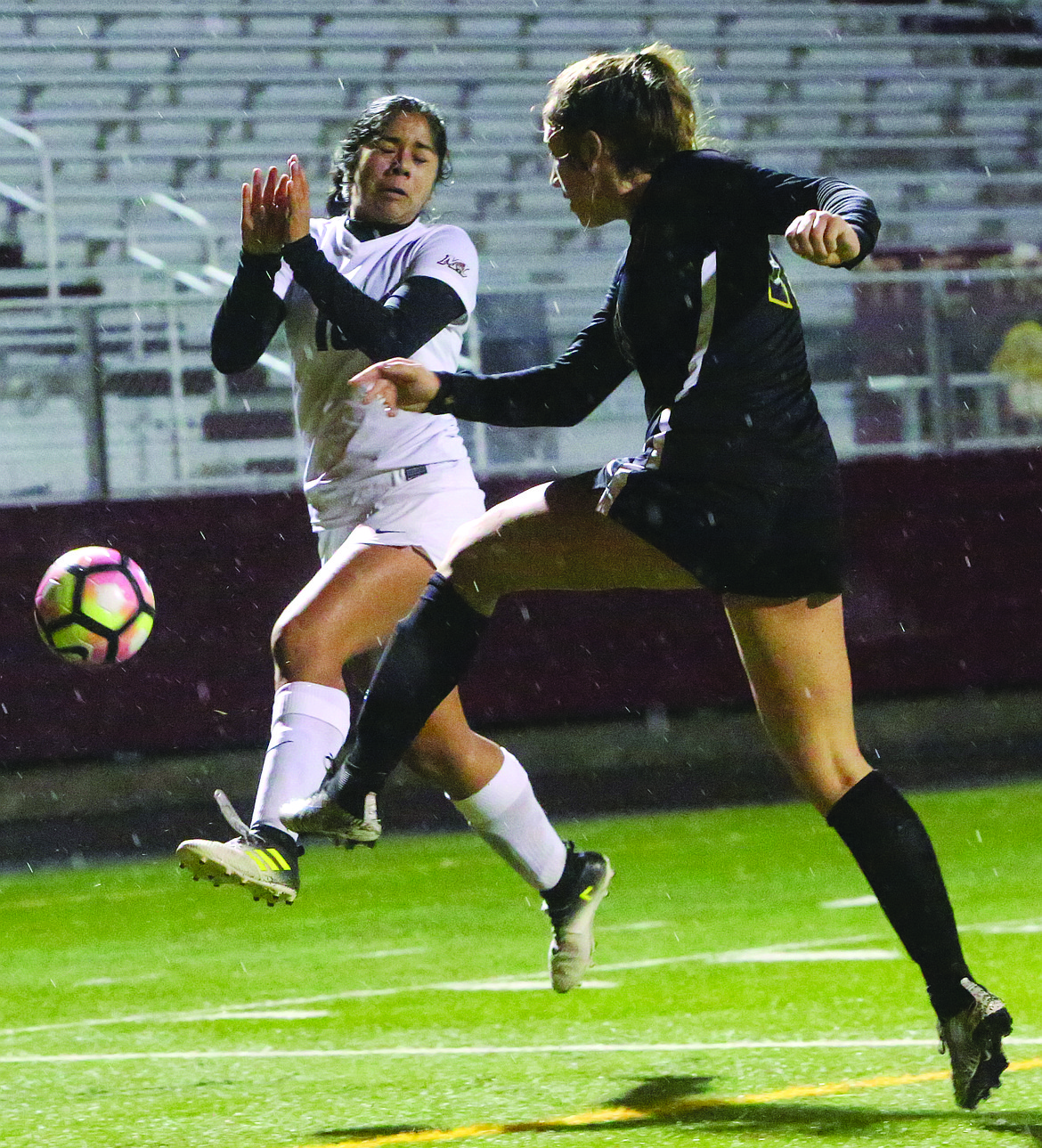 Connor Vanderweyst/Columbia Basin Herald
Wenatchee defender Ellie Toth clears the ball in front of Moses Lake's Emily Mendoza.