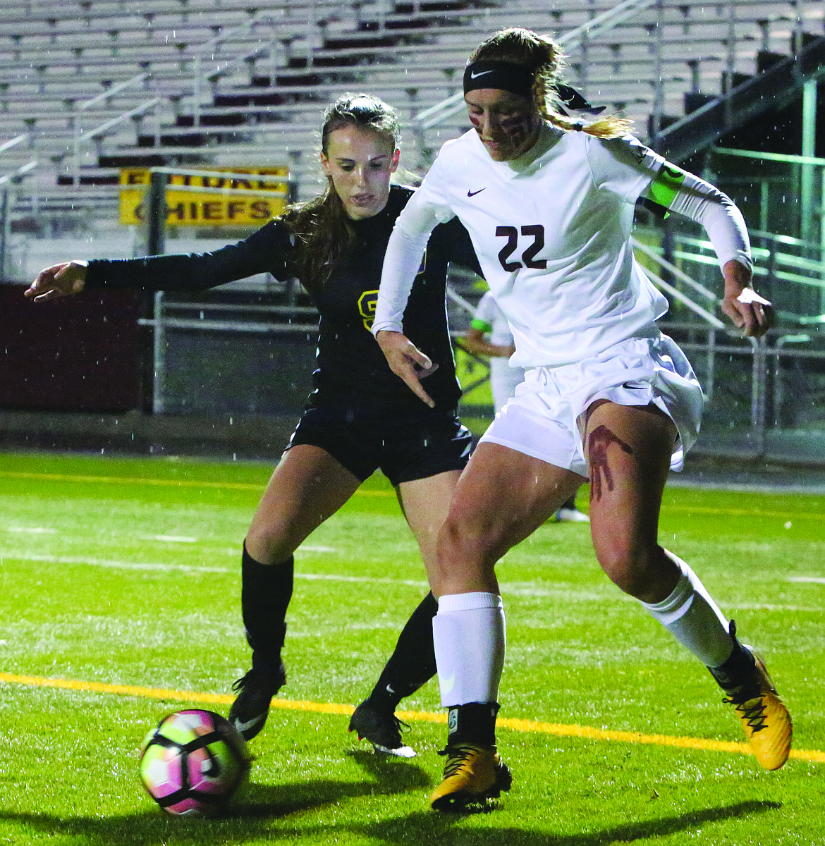 Connor Vanderweyst/Columbia Basin Herald
Moses Lake forward Abby Rathbun (22) jostles for position against Wenatchee defender Ellie Toth.