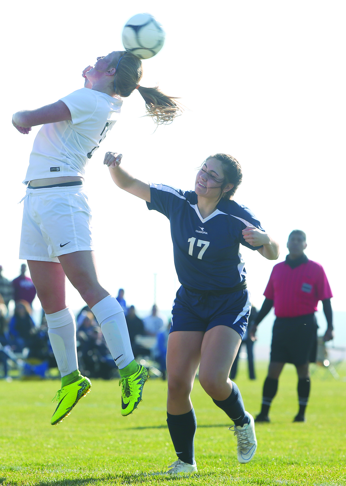 Connor Vanderweyst/Columbia Basin Herald
Warden's Bailey Whitney leaps for a header attempt against Naches Valley.