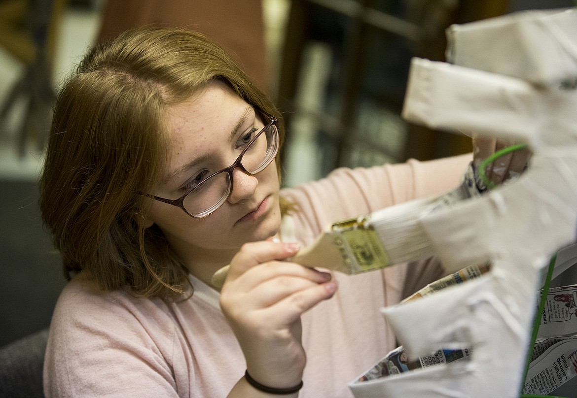 LOREN BENOIT/Press

Helenna O&#146;Brien, 14, paints the ribs of a skeleton during a workshop held at Emerge on last Thursday. Students who attended the three workshops learned sculpting techniques and paint layering. The skeletons will be on display at the Day of the Dead Fiesta on Thursday at the Human Rights Education Institute.