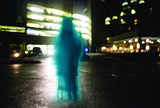 Paranormal crosses Press photographer's path again