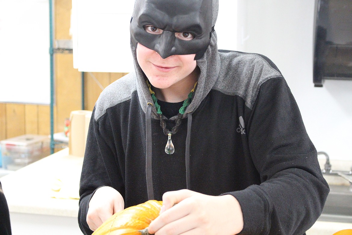 (Photo courtesy RANDY WILHELM)
Lake Pend Oreille High School students were in the Halloween spirit last week as they prepared their pumkin works of art for a jack-o&#146;-lantern stroll at Valley Vista Care of Sandpoint last Tuesday.