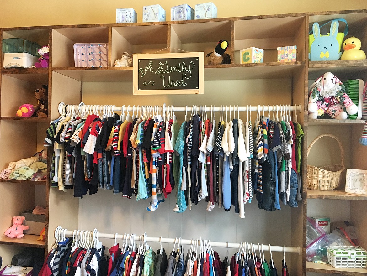 Gently used baby clothes hang inside the Hope Family Resource Center&#146;s Baby Boutique in Kalispell.
