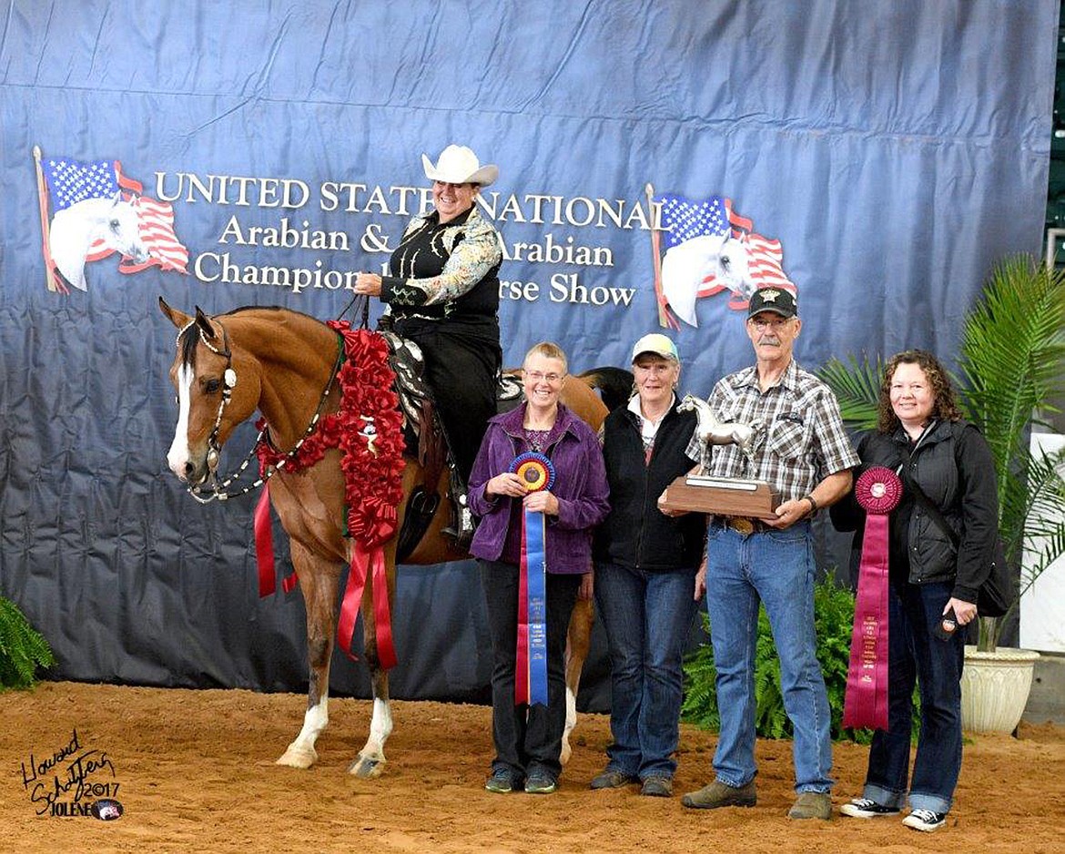 (Courtesy photo)It took a family team to get Dusty to and from Tulsa for his winning performance, including, from left: Barbara Tibbs (mounted), Laurie Tibbs, Marianne Love, Kevin Brown, and Debbie Love.