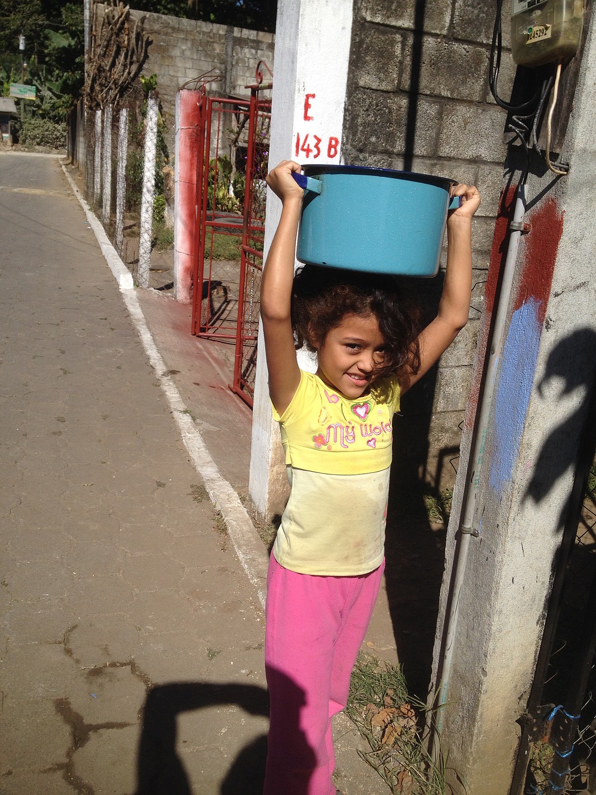 This little girl lives in San Juan Maza and is carrying water two kilometers from the only source available, a polluted steam.  (Courtesy photo)