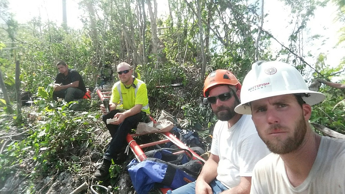 Courtesy photo
Electrical line crews take a break during repair work in Puerto Rico. The crews were among the first on the island after Hurricane Maria caused extensive damage.