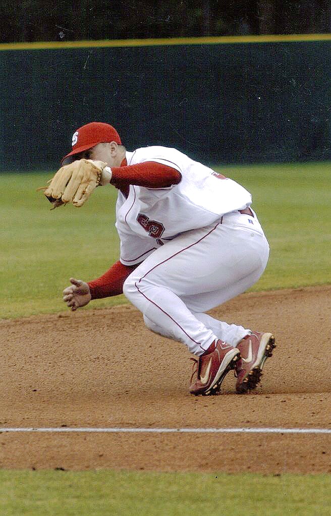 North Carolina State photoFormer Big Bend third baseman Dustin Knight, who later played at North Carolina State, fields a line shot to third base during his playing days with the Wolfpack.