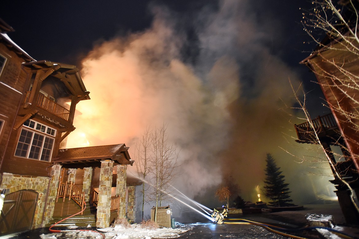 A townhouse on Big Mountain was totally destroyed and another townhouse was damaged during a massive fire Thursday night, November 2.(Brenda Ahearn/Daily Inter Lake)