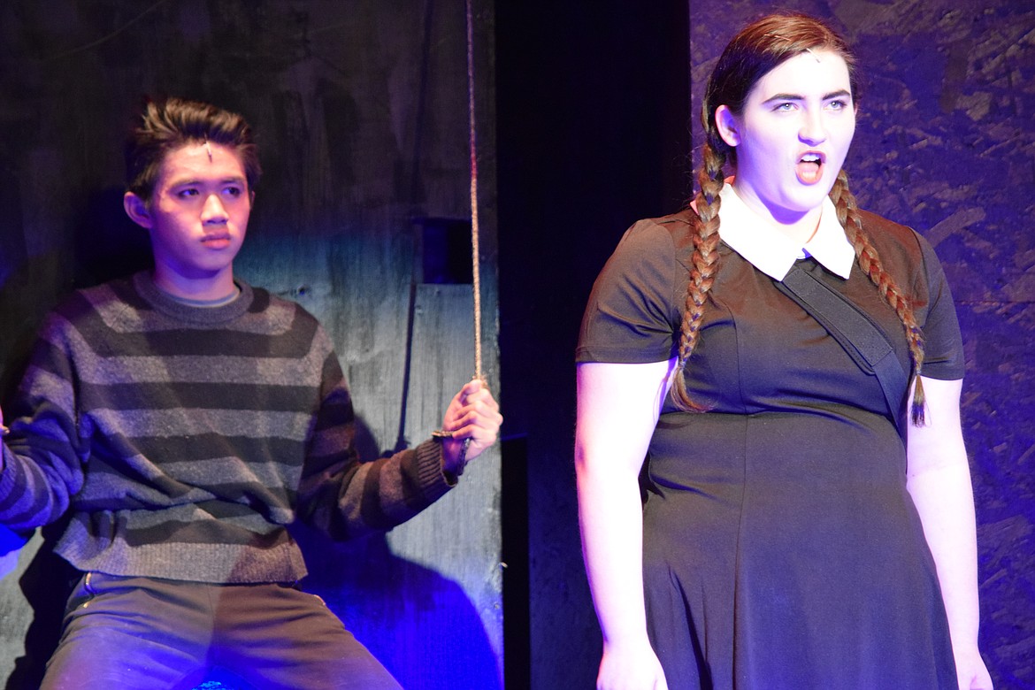 Richard Byrd/Columbia Basin Herald
Wednesday Addams (Claire Smith) hits a high note as her little brother Pugsley Addams (Dricher Von Gesulga) looks on.