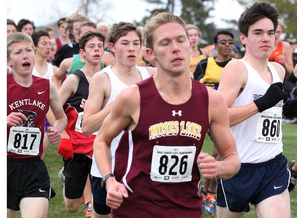 Rodney Harwood/Columbia Basin HeraldMoses Lake senior Zach Owens (826) runs with the pack during the first mile of Saturday's 4A state cross country race at Sun Willows Golf Course in Pasco.