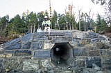 Masons working on final walls of Sun Road reconstruction