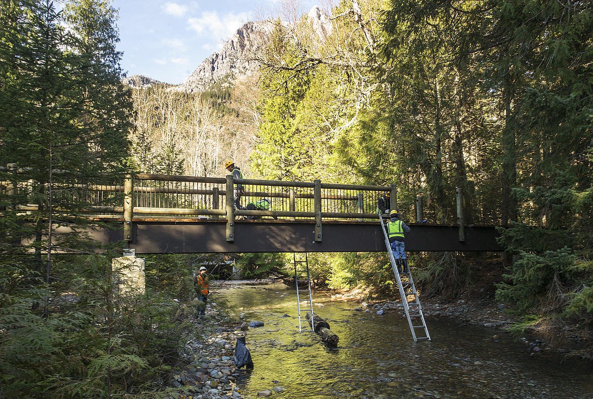 Crews were on building a new pedestrian bridge across Avalanche Creek.