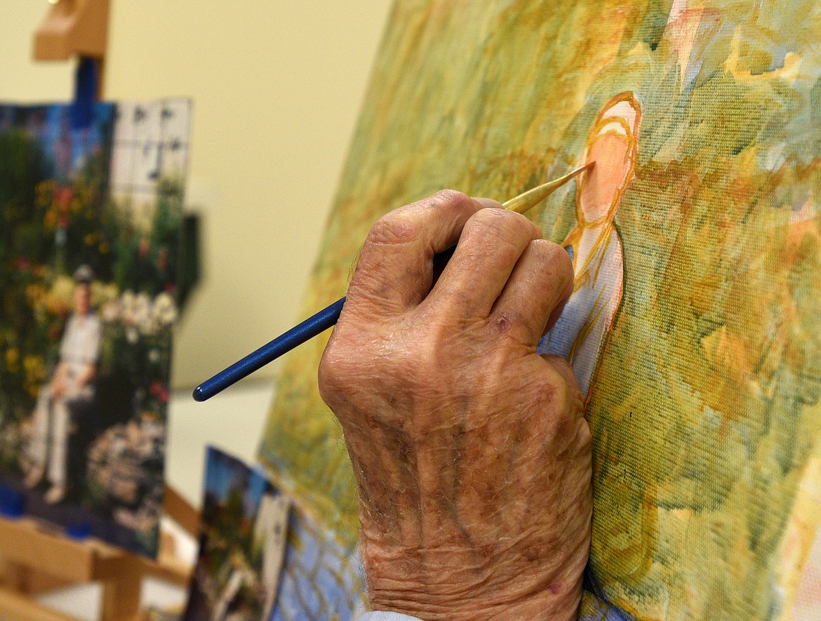 Bob Martens paints during a class at the Hobby Lobby in Kalispell on Saturday. (Aaric Bryan/Daily Inter Lake)