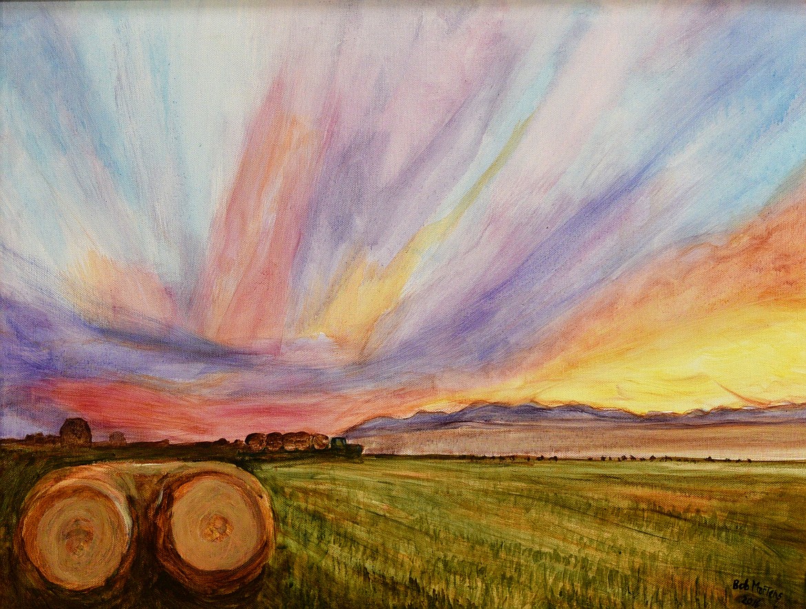 A painting of a sunrise using acryllic paint by Bob Martens. (Aaric Bryan/Daily Inter Lake)