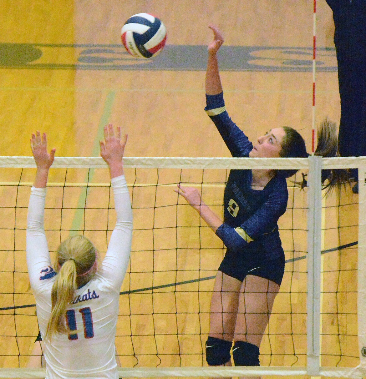 POLSON HIGH School volleyball player Kaelyn Smith attacks the Columbia Falls defense during a regular season match. The Lady Pirates hope to build on their 2017 success during the 2018 campaign. (Photo by Jason Blasco/Lake County Leader)