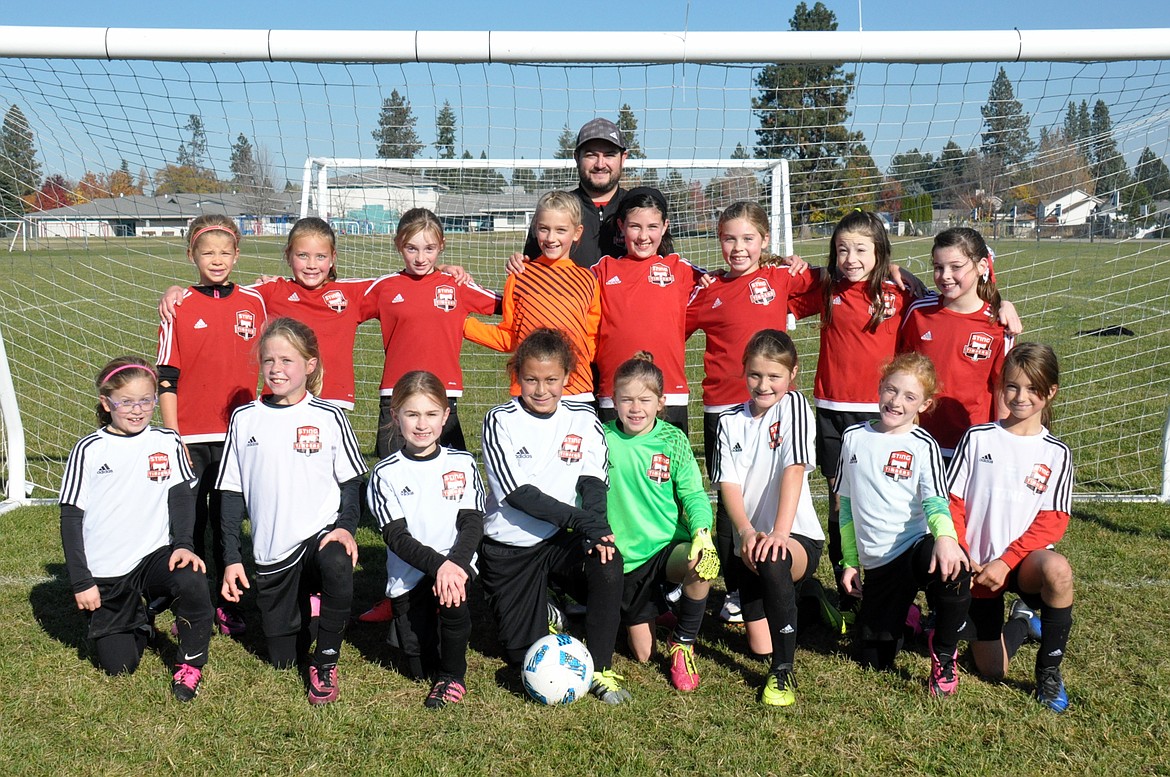 Courtesy photo
On Saturday the Sting Timbers FC &#146;08 girls green soccer team beat the Sting Timbers FC &#146;08 girls yellow 5-4. Izabella Entzi, Libby Montgomery, Anna Ploof, Cameron Fischer and Macy Walters each had a goal for the green team. Allison Carrico led the yellow team with 3 goals, Kamryn Kirk had 1 goal and Isabella Grimmett had an assist. Pictured are the yellow and green teams; front row from left, Ashley Breisacher, Nora Ryan, Sadie Evans, Allison Carrico, Savannah Spencer, Kamryn Kirk, Teagan Slusher and Isabella Grimmett; and back row from left, Ella Pearson, Anna Ploof, Cameron Fischer, Libby Montgomery, Hanna Shafer, Izabella Entzi, Ellie Moss, Macy Walters and coach Tony Grimmett.