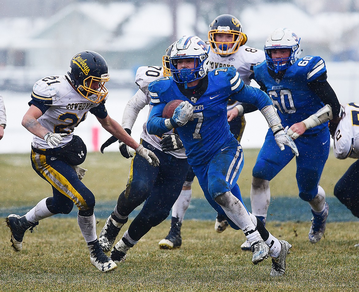 Colten McPhee runs through the Cowboys&#146;  defense.