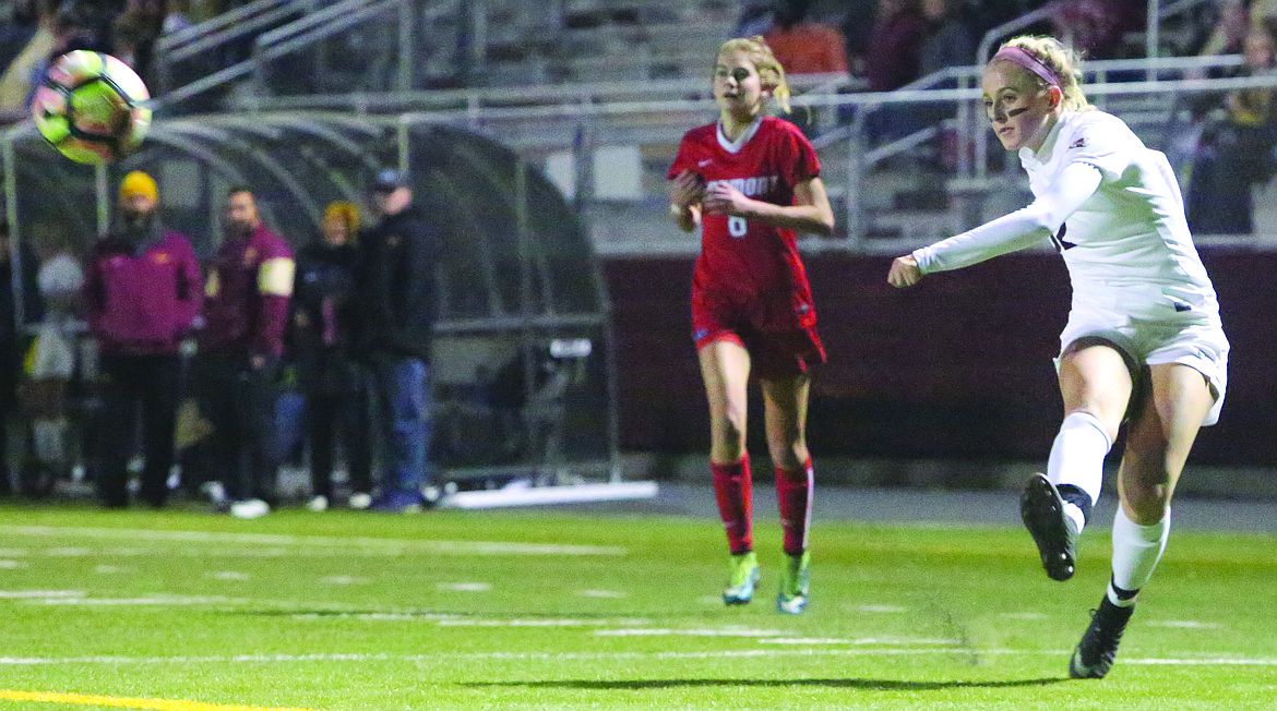 Connor Vanderweyst/Columbia Basin Herald
Moses Lake midfielder Morgan Skone shoots and scores in the 25th minute against Eastmont.