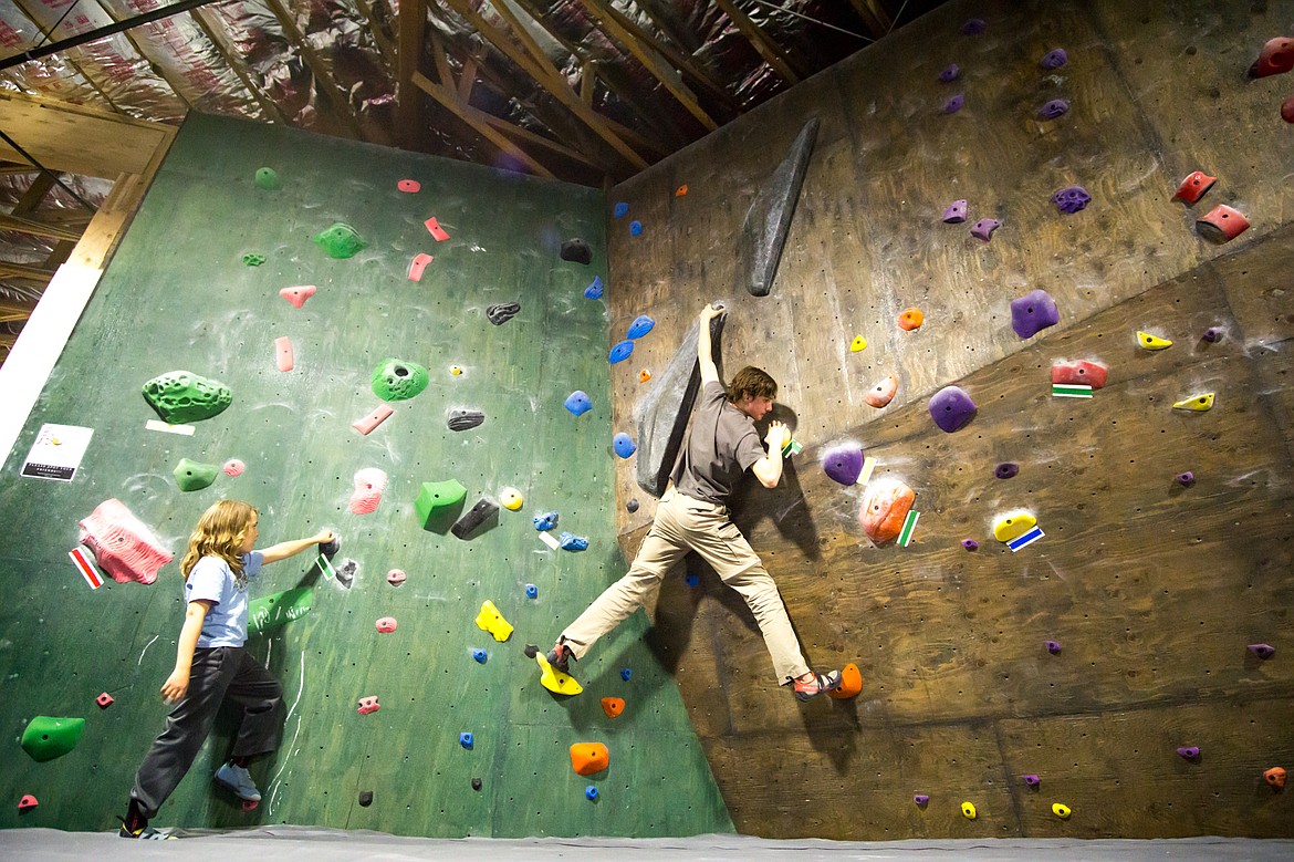 Members of the Rockfish Scalers get started on a wall traversing exercise during a team practice last week at Rockfish Climbing and Fitness in the Mountain Mall. (Daniel McKay photos/Whitefish Pilot)