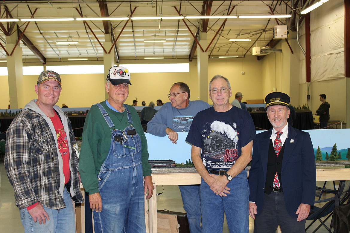 Photo by Tom Dempsey
Part of the Spokane, Panhandle, and Palouse Model Railroad Club at the Spokane Model Train Show at the Spokane County Fair &amp; Expo Center on October 15. From left to right: Kevin Callos from Bonners Ferry, Doug Sassman from Veradale, Ron Tilton from Spokane, Sam Rapp from Coulee City, and Vic Cherven from Bonners Ferry.