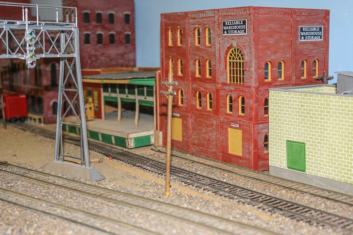 Photo by Mandi Bateman
A couple of the industries in Berkeley, California portion of Vic Cherven&#146;s S gauge layout. The green building at right is a produce warehouse.