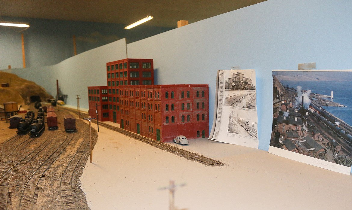 Photo by Mandi Bateman
The C&amp;H Sugar Co. refinery at Crocket, California, with Port Costa freight yard at left, with photo reference hanging on the backdrop of Vic Cherven&#146;s layout.