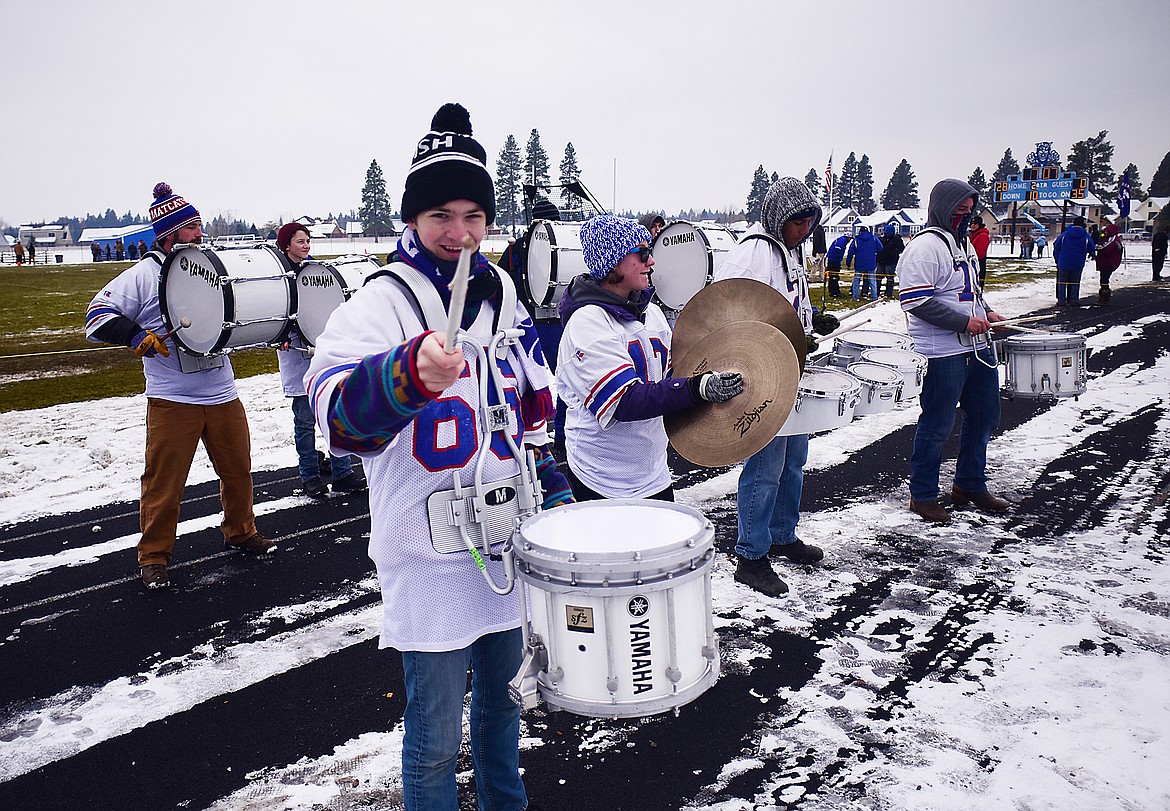 The drumline fires up the crowd.