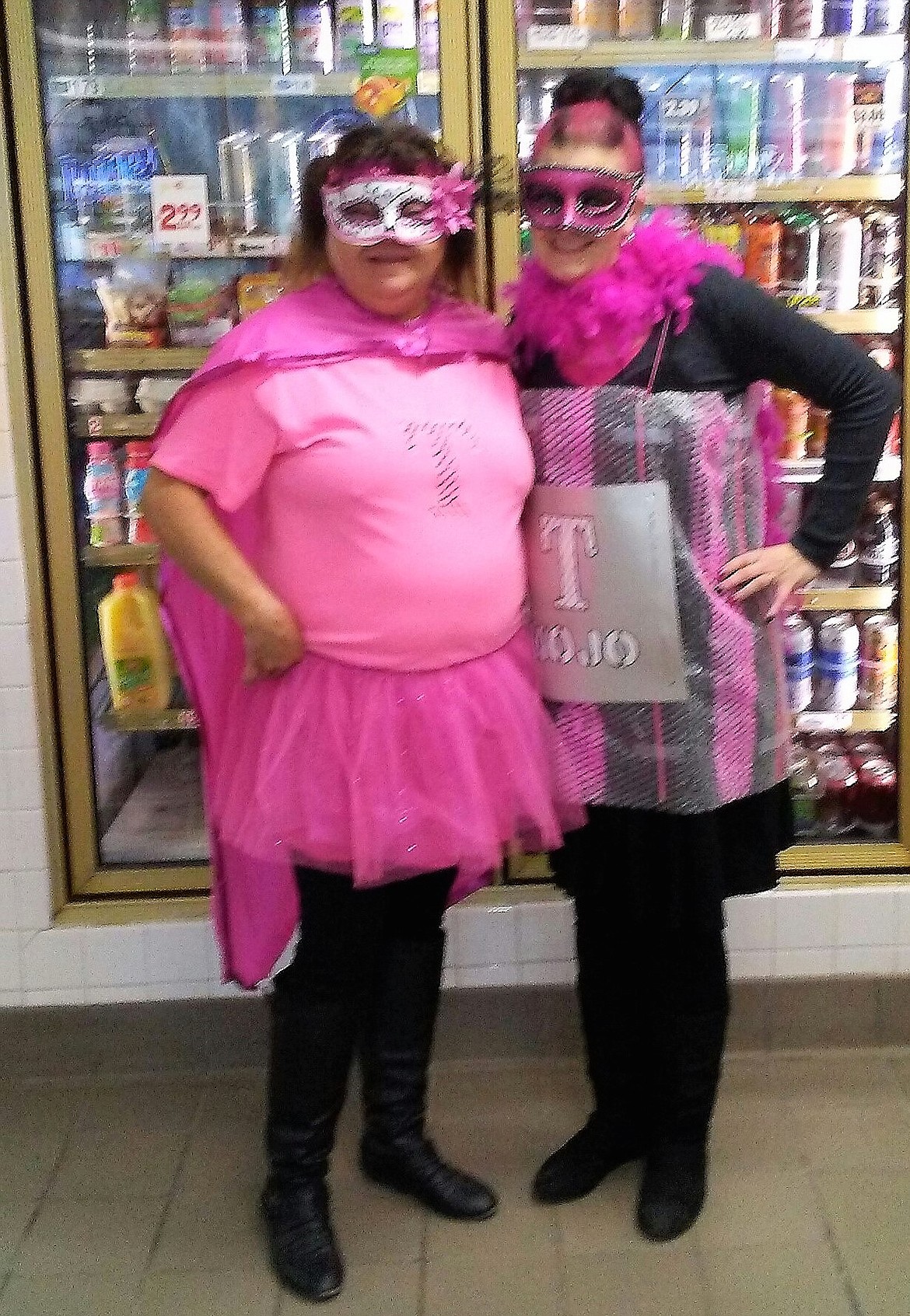 Tammy and Karen working at Exxon in St. Regis get into the &#147;spirit&#148; of things on Halloween. (Photo by Brenda White)