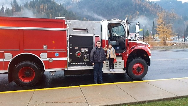 Costume contest winner, Alli Wilkinson of Osburn, also got a ride to school Thursday morning.