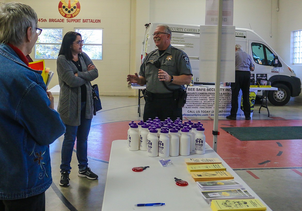 Photo by Mandi Bateman
Boundary County Sheriff Dave Kramer happily spoke with people about ways to not be a victim.