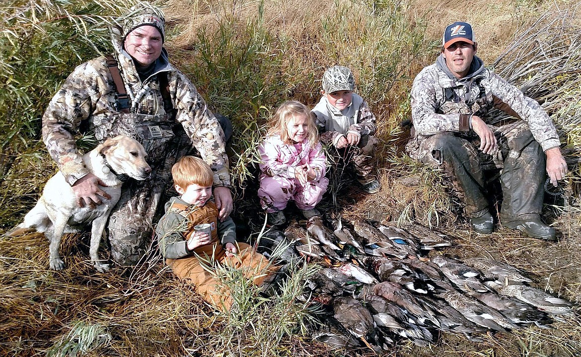 Pete Fisher photo - A great day of airboat hunting with limits of waterfowl. Pictured from left are Todd Eldred, his son Henry, Lilee, Mason, and Levi Meseberg. Mike Meseberg not pictured.